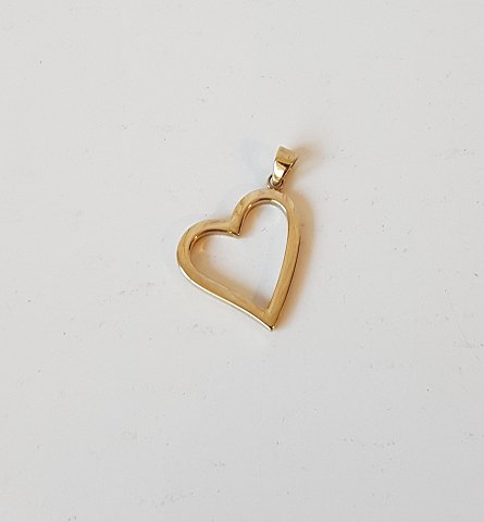 Hjerte vedhæng i 8kt guld.