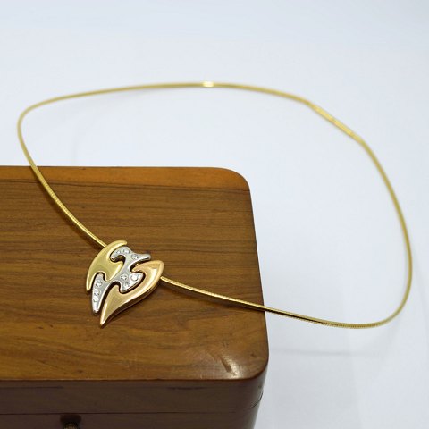 Georg Jensen; Fusion  necklace of 18k gold set with diamonds