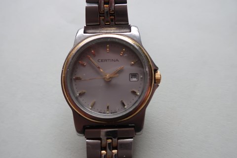 Vintage wristwatch incl. watchchainWith a second hand and a dateBrand: Certina, Schweiz, - the traditional good qualityDiam: about 2,5cmThe glas is wholeThe watch is workingIn a good condition