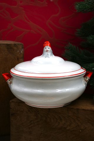 Old Swedish Christmas tureen in faience with a gnome on the top of the lid and on the handles...