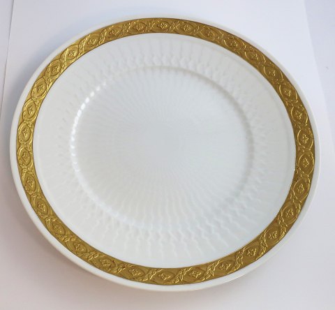 Royal Copenhagen. Vifte med guld. Middagstallerken. Model 11519. Diameter 25,5 cm. (1 sortering)
