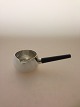 Danam Antik 
presents: 
Georg 
Jensen Sterling 
Silver Gravy 
Pitcher by 
Henning Koppel 
no. 1111