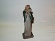 Bing & Grondahl FigurineGirl in Green Coat holding Flowers
