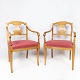 A pair of Empire armchairs of birch wood and upholstered with velvet, from 
around the 1840s.
5000m2 showroom.
