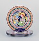 Bjørn Wiinblad for Rosenthal, a set of four hand-painted Christmas plates with biblical motifs.