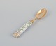 Royal Copenhagen Flora Danica/Georg Jensen. Dining spoon, hand-painted with Flora Danica motif. Handle by Georg Jensen in gilt sterling silver.