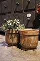 Old flower pots in marble in nice colors. 
H: 17cm.