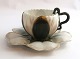 Bing & Gröndahl. Small cup. Handle in the shape of a snake. Diameter of saucer 11.5 cm. Height of cup 4.5 cm. Saucer has a defect. See photo.