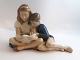 Königliches Kopenhagen. Porzellanfigur. Lesende Kinder. Modell 4670. Länge 19,5 
cm. Höhe 13,5 cm. (1 Wahl)