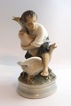 Royal Copenhagen. Porcelain figure. The Goose Thief. Model 2139. Height 17 cm. (3 quality)