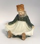Royal Copenhagen. Sitting Fanö girl. Model 1315. Height 14 cm. (2 quality)