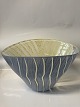 Large glass bowl in beautiful shades.Measures 16.5x22x28 cm.