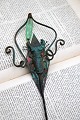 Unique flower stick in copper with glass bead and insect made by jewelry artist Torben Hardenberg...