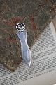 Old bookmark in silver, stamped 830s with floral motif.