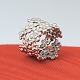 Ole Lynggaard; Elderflower ring of 14k white gold, set with diamonds