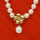 Ole Lynggaard, Charlotte Lynggaard; Clasp of 18k gold, set with diamond and pearl