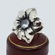 Regitze Overgaard for Georg Jensen; Flowerring in silver with moonstone, no. 562a