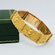 Lapponia; Wide bracelet in 14k gold