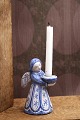 L. Hjorth ceramic angel with blue glaze holding a small candle. No.421.H: 9.5cm.