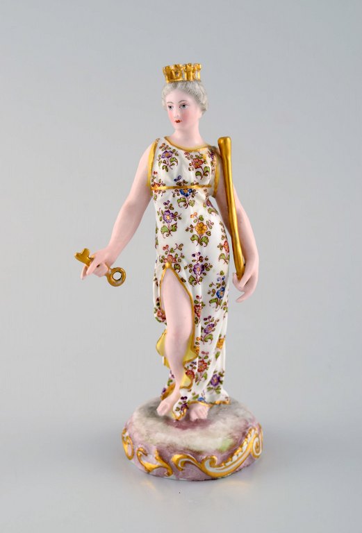 Meissen, Tyskland. Sjælden håndmalet porcelænsfigur. Dronning med krone, nøgle og scepter. Sent 1800-tallet.