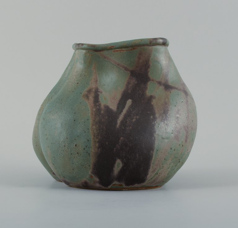 Christina Muff, Danish contemporary ceramicist (b. 1971). Unique seedpod vessel made from stoneware clay, with matte blue and brown glaze.