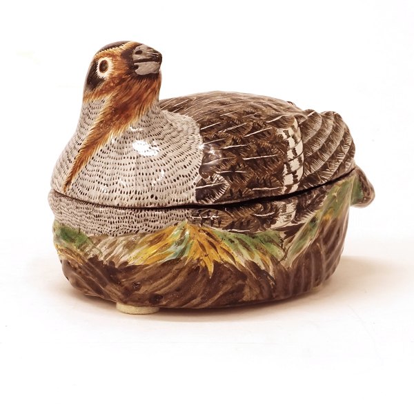 Polychrome Rococo faience tureen in the shape of a partridge. Signed, Marieberg, Sweden, circa 1770. H: 9,5cm. L: 16cm