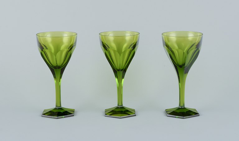 Val St. Lambert, Belgium. A set of three green Legagneux white wine crystal 
glasses.