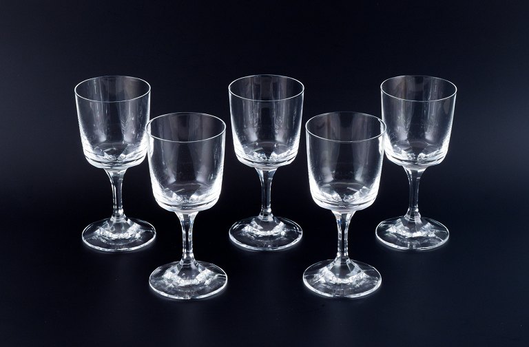 A set of five René Lalique Chenonceaux red wine glasses.Clear mouth-blown crystal glass. Facet-cut stem.