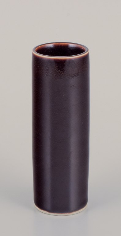Hertha Bengtson for Rörstrand, Sweden. Unique ceramic vase. Cylinder-shaped with brown glaze.