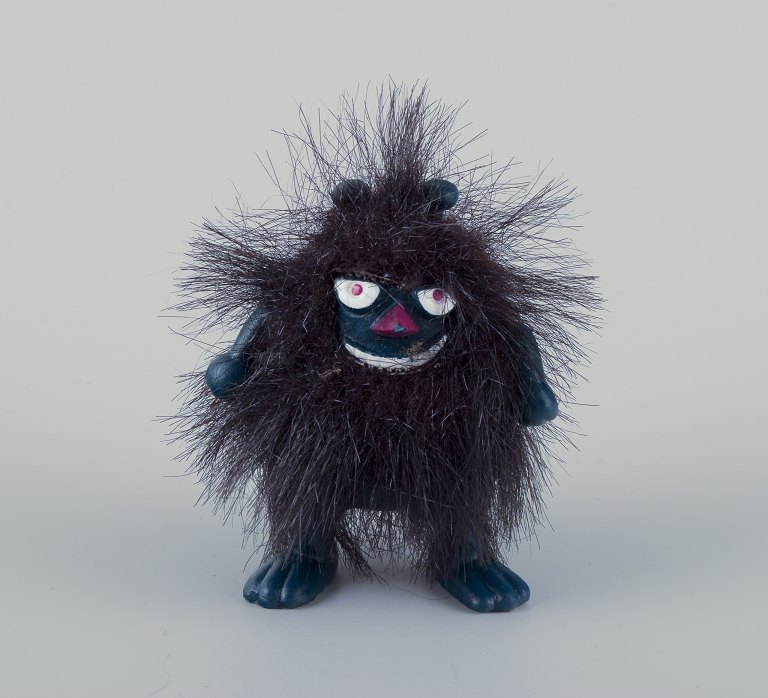 Martinex, Finland. ‘Stinky’ Mummy figure of dark blue plastic covered with black hair.