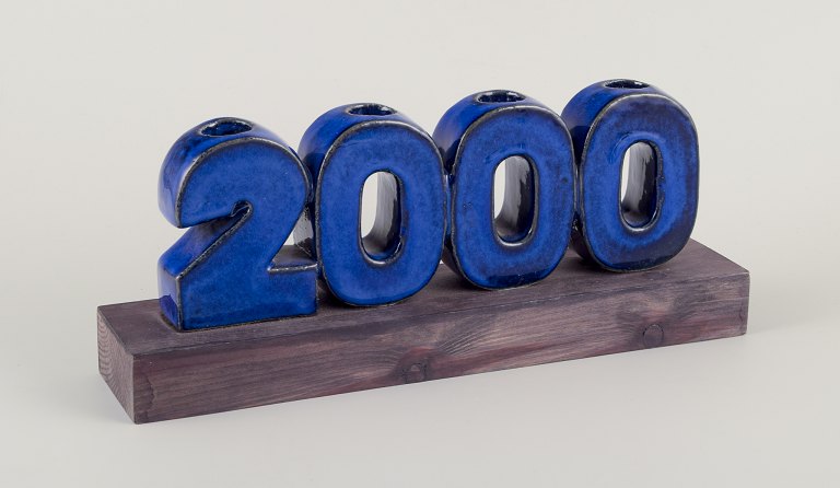 Lisa Larson for K-Studion, Gustavsberg, Sweden.
‘Millenium 2000’ stoneware candleholder for four candles.