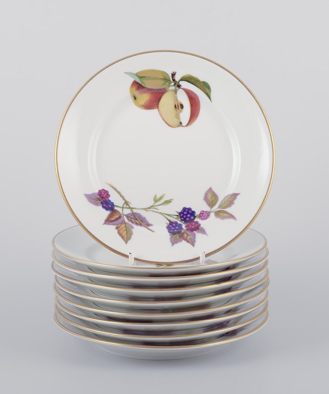 Royal Worcester, England. Et sæt på ni Evesham porcelænstallerkener dekoreret med frugter og guldkant.