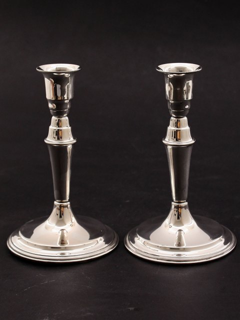 A pair of 830 silver candlesticks
