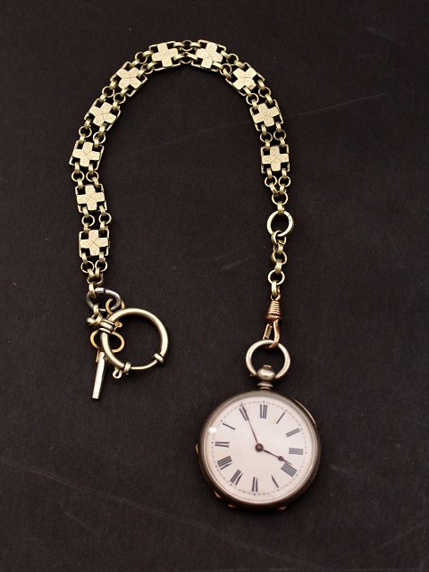 Silver pocket watch with key winding