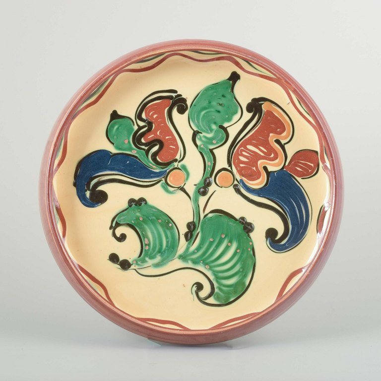 Kähler, Danmark
Dekorativt væg- eller serveringsfad i glaseret keramik.