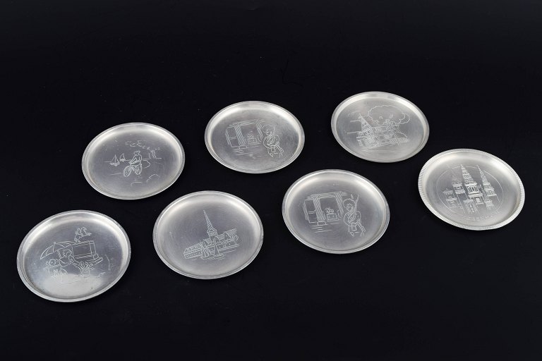 Just Andersen, Danmark.Sæt på syv flaskebakker i tin.