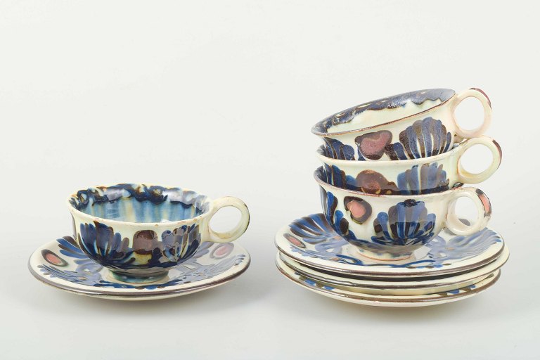 Kähler, Danmark
Fire tekopper med tilhørende underkopper i Marguerite-stellet.