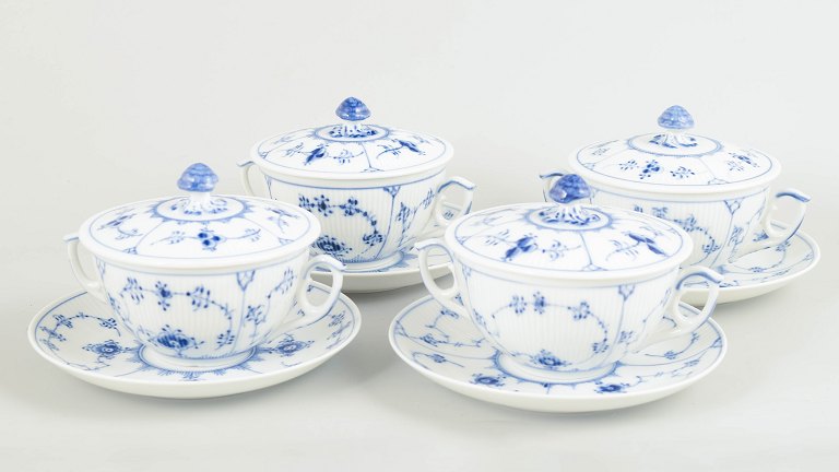 Royal Copenhagen Blue Fluted Plain, set of four bouillon cups with matching saucers.