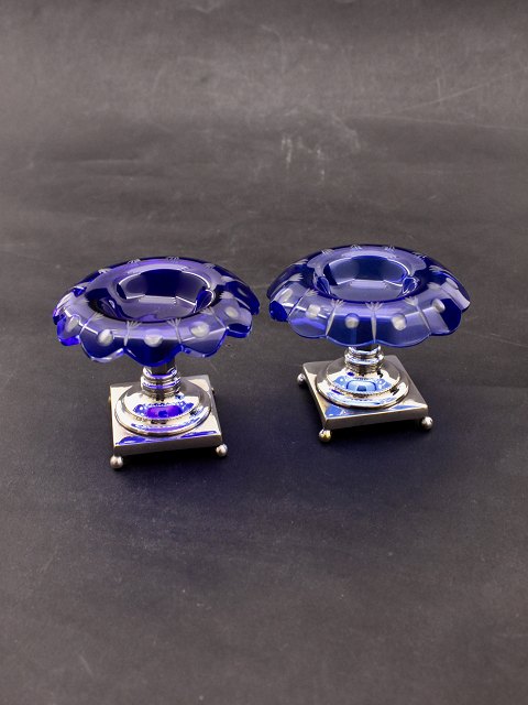 A pair of salt cellersin blue glass