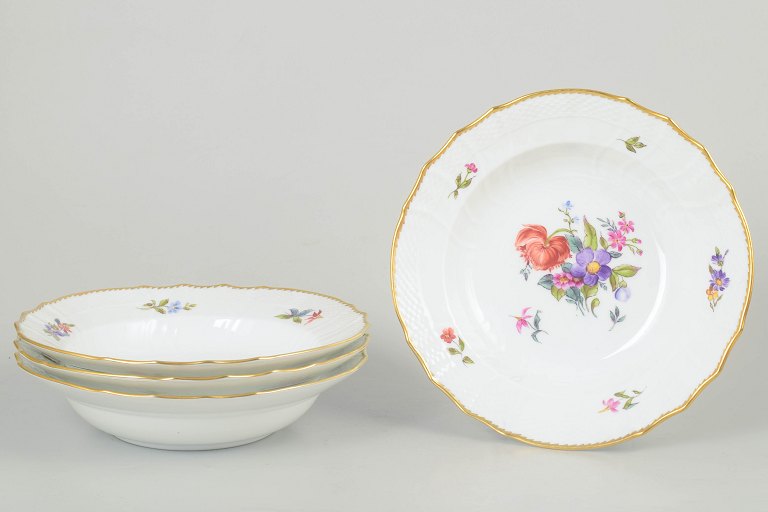 Royal Copenhagen Saxon flower, set of four deep plates.