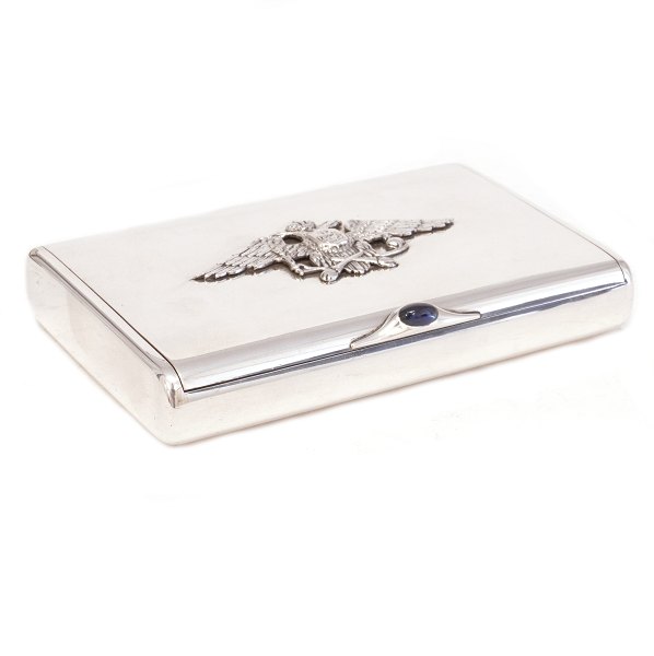 Russian silver cigarette case by Ivan Ekimovich Morozov, St. Petersburg, in its original fitted caseDecorated with the Russian Imperial double-headed eagle. HallmarkedDimensions: 10,3×6,8cm. W: 200gr