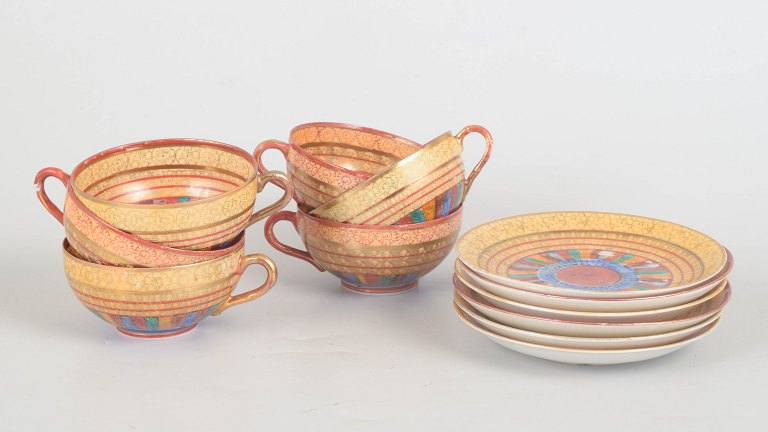 Japanese Kutani Art Deco, set of six teacups with matching saucers.