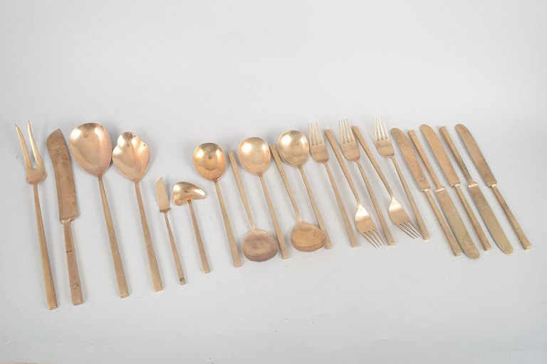 Sigvard Bernadotte for Scanline, complete bronze dinner cutlery set for five with serving utensils.