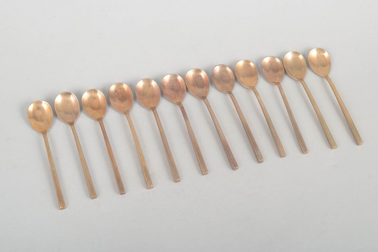 Sigvard Bernadotte for Scanline, set of twelve bronze coffee spoons.